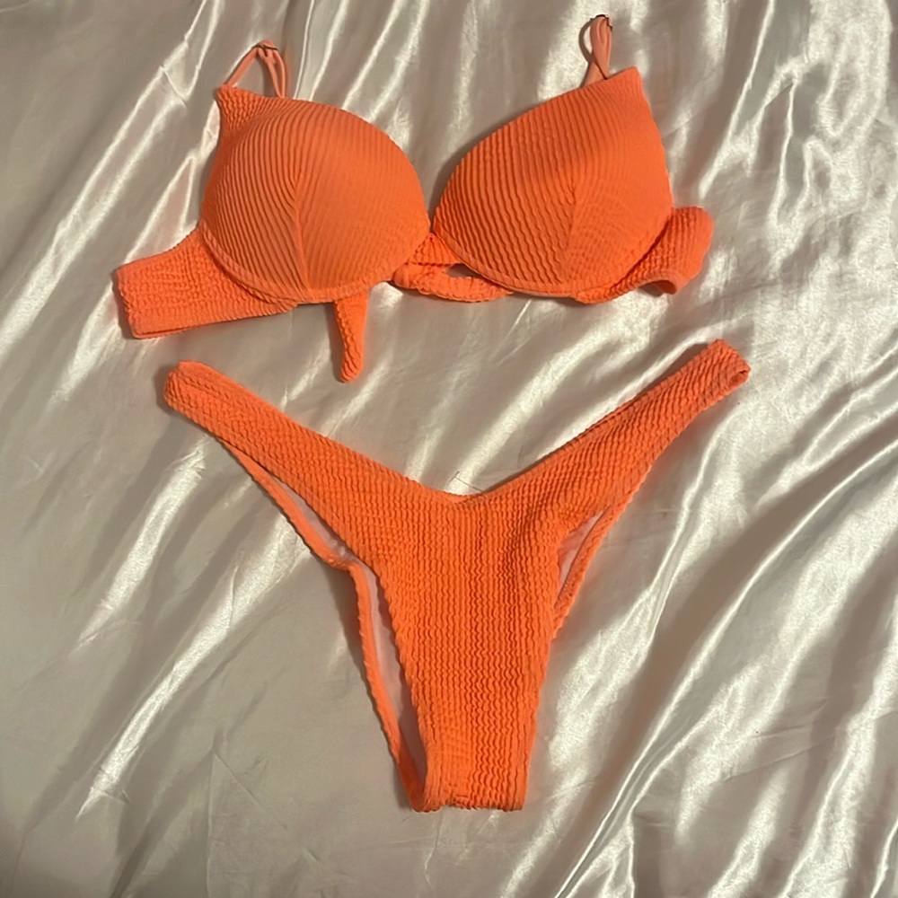 This is a orange tie in the back bikini in size XL and It is from SHEIN